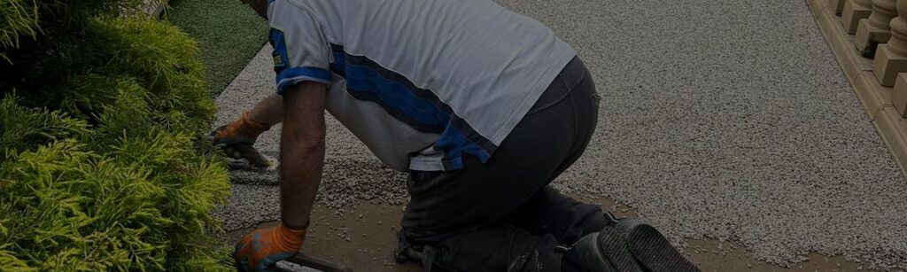 Resin bound surface being laid in a garden