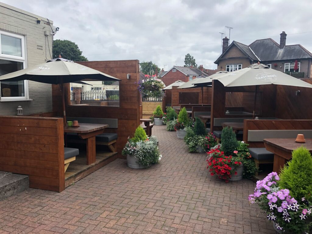 Original tiled courtyard before resin driveway installation and beer garden redevelopment