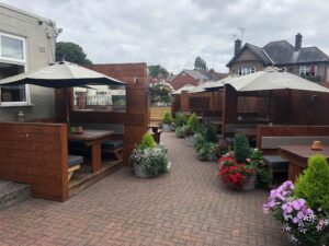 Original tiled courtyard before resin driveway installation and beer garden redevelopment